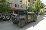 Kosovo trip
Machine gun mounted KFOR Humvee patrols through the town of Gjilan.