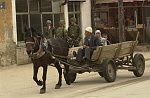 Kosovo trip
Ethnic Albanian family on their horse drawn cart, pass American soldiers from the 325 Airborne Infantry Regiment patroing the town of Vitina.