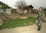 Kosovo trip
Master Sgt. Mike Boom from the 325 Airborne Infantry Regiment patrols the town of Vitina.